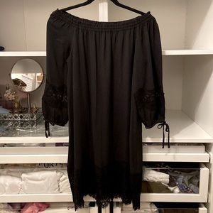 Off the shoulder black silky dress with lace detail on sleeves and bottom hem